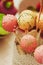Pink and yellow Cake pops close up picture, food concept