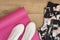 Pink yoga mat, Female Sneakers, Sport Shoes, Leggings In Flat Lay Style, Top View. Fashion Trendy Trainers, Hipster Set. Fitness C