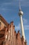 Pinnacles of Marienkirche church and Fernsehturm TV tower in Berlin