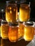 Pint Canning Jars Filled with Honey Colored Syrup