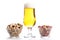 Pint of lager and peanuts on white background