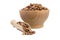 Pinto bean in wooden bowl and scoop isolated on white background. nutrition. bio. natural food ingredient