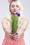 Pinup Caucasian Woman Holding Bunch of Vivid Lilac Flowers In Fr