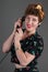Pinup Girl Smiles While on Black Telephone