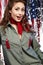 Pinup woman in military clothing