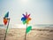 Pinwheel on sand Beach Summer Holiday background outdoor