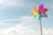 Pinwheel windmill summer beach background concept for vacation copy or message