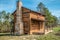 Pioneer log cabin in the woods