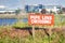 Pipe Line Crossing warning sign posted on the shoreline of South San Francisco Bay Area, San Jose, California