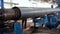 Pipe manufacturing Tube. Pipe plant. Iron tube welding. Pipe expansion. Sparks of welding. Tap. Factory. Machine tools.