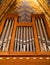 Pipe organ frontal shot, shiny silver prospect pipes pattern, row closeup. Sacral music, church musical service and