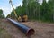 Pipelayer with side boom Installation of  gas and crude oil pipes in ground. Construction of the gas pipes to new LNG plant. Soft