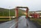 Pipes of a geothermal station dodging a road in Iceland in the Krafla caldera in the north of Iceland