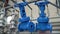 Pipes and valves with blue handles for water. Production of water valves. Blue water valves.