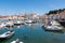 Piran - Colorful boats in serene harbor of coastal town Piran, Slovenia, Europe