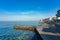 Piran concrete beach with clear water in the morning