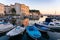 Piran harbour with boats in the sunset