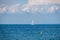 Piran - Majestic sailing boat glides through crystal clear waters of Gulf of Piran