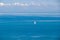 Piran - Majestic sailing boat glides through crystal clear waters of Gulf of Piran
