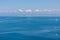 Piran - Majestic sailing boat glides through crystal clear waters of Gulf of Piran. Bird