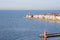 Piran Picturesque seaside old town in Slovenia against snow covered mountains in winter.