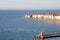 Piran Picturesque seaside old town in Slovenia against snow covered mountains in winter.