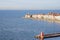 Piran Picturesque seaside old town in Slovenia against snow covered mountains in winter.