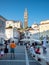 PIRAN, SLOVENIA - 08/15/2020: Tartini square with people and ancient tower