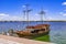 Pirate schooner Black Roger in the blue-green waters of Dnieper River in Dnipro. Tourist ship on