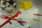 Pirate skull toy with plastic forks and the sand
