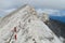 Pirin mountains in Bulgaria, gray rock summit during the sunny day with clear blue sky