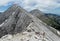 Pirin mountains in Bulgaria, gray rock summit during the sunny day with clear blue sky