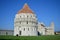 Pisa baptistery cathedral and famous Leaning Tower. Romanesque and gothic architecture. Pisa. Tuscany. Italy.