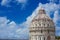 Pisa Baptistry dome with clouds