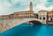 Pisa cityscape with Arno river and Ponte di Mezzo bridge, Italy