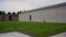 Pisa, Italy. Girl walks with her dogs near the cemetery Camposanto