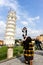 Pisa, Italy - March 17, 2012: People taking photo near the Tower of Pisa Torre di Pisa