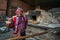 Pisac Market, Peru - September 2018 - Peruvian man baker holding a pie