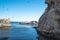 Pismo Beach cliffs and flock of birds, pelicans, cormorants and seagulls. Pacific coast, CA