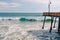 Pismo Beach pier and stormy Pacific ocean.. An old wooden pier in the heart of Pismo Beach city, CA