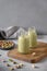 Pistachio milk in bottles, lactose free. Vegan nutty plant based milk
