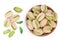 Pistachio in wooden bowl isolated on white background with clipping path and full depth of field. Top view. Flat lay