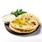 Pita bread and creamy white sauce, isolated on a clean white background.