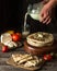 Pita bread on wooden board with feta cheese and tomatoes and pepper. Still life of food. Georgian cuisine. Spanish food. National