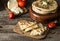 Pita bread on wooden board with feta cheese and tomatoes and pepper. Still life of food. Georgian cuisine. Spanish food. National