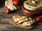 Pita bread on wooden board with feta cheese and tomatoes and pepper. Still life of food. Georgian cuisine. Spanish food. National