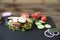Pita - sandwich, sabiche stuffed with chicken, tomatoes, cucumbers, salad on a black plate and wooden background