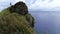 Pitcairn Island panning shot to rock cliff