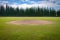 Pitcher`s Mound with Baseball - Cypress Outfield Wall