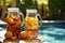 pitchers of fruit-infused water and lemonade near pool